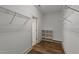 Spacious walk-in closet featuring built-in shelving and ample storage space for an organized wardrobe at 436 Edgepine Dr, Holly Springs, NC 27540