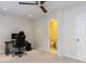 Bedroom includes a gaming setup and adjacent bathroom with a tiled floor and a functional layout at 4646 Fawnbrook Cir, Raleigh, NC 27612