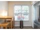 Bright dining area with natural light and modern table setting at 4646 Fawnbrook Cir, Raleigh, NC 27612
