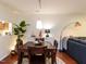 Inviting dining space with dark wood table, seating for four, and stylish decor at 4646 Fawnbrook Cir, Raleigh, NC 27612