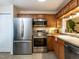 Well-equipped kitchen featuring stainless steel appliances and a convenient layout at 4646 Fawnbrook Cir, Raleigh, NC 27612