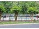 Beautiful community pool area with lush trees providing a relaxing resort-like setting at 4646 Fawnbrook Cir, Raleigh, NC 27612