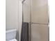 Shower with glass enclosure and neutral towel at 4646 Fawnbrook Cir, Raleigh, NC 27612