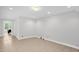 Spacious basement with tile flooring, recessed lighting and potential laundry hookups at 4874 Thom Rd, Mebane, NC 27302