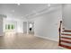 Spacious basement area with a tiled floor and access to the outside at 4874 Thom Rd, Mebane, NC 27302