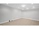 Spacious basement features tile flooring, white walls and neutral color at 4874 Thom Rd, Mebane, NC 27302