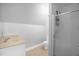Neutral bathroom with shower, commode and vanity at 4874 Thom Rd, Mebane, NC 27302
