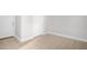 Bedroom with white walls, neutral tile flooring, and white doors at 4874 Thom Rd, Mebane, NC 27302