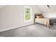 Bedroom featuring a window and a metal bed frame at 4874 Thom Rd, Mebane, NC 27302