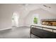 Bedroom featuring carpet and a metal bed frame at 4874 Thom Rd, Mebane, NC 27302