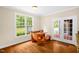 Charming breakfast nook with a wooden table, benches, and a view of the outdoors at 4874 Thom Rd, Mebane, NC 27302