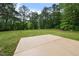 The backyard features a large patio, perfect for entertaining or enjoying the outdoors at 5020 Mimosa Dr, Durham, NC 27713