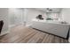 Spacious living room with seating, tv, and neutral walls at 5020 Mimosa Dr, Durham, NC 27713