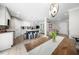 Open floor plan has a dining area flowing into the kitchen and living room at 5020 Mimosa Dr, Durham, NC 27713