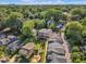 A calm neighborhood featuring well-manicured lawns and tree-lined streets at 511 Hamilton Cottage Way, Raleigh, NC 27605