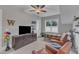 Cozy bonus room with natural light and comfortable seating at 511 Hamilton Cottage Way, Raleigh, NC 27605