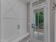 Functional entryway with custom storage cabinets and easy access to the outdoors at 511 Hamilton Cottage Way, Raleigh, NC 27605