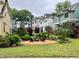 Charming outdoor fire pit area with seating, perfect for gatherings at 511 Hamilton Cottage Way, Raleigh, NC 27605