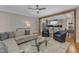Bright, open living area with a hardwood floor and easy access to the kitchen and dining area at 511 Hamilton Cottage Way, Raleigh, NC 27605