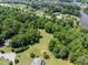 Spacious wooded homesite near neighborhood, ready for new construction with potential for customization at 5308 Stableview Ct, Holly Springs, NC 27540
