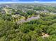 Beautiful lake community with tree-lined streets and houses at 5308 Stableview Ct, Holly Springs, NC 27540