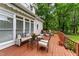 Relax on the beautiful back deck, perfect for outdoor entertaining and lounging at 5308 Stableview Ct, Holly Springs, NC 27540