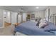 Spacious bedroom features built-in shelving and an open doorway at 5308 Stableview Ct, Holly Springs, NC 27540