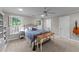 Bright bedroom with plenty of natural light, windows, and white trim throughout at 5308 Stableview Ct, Holly Springs, NC 27540