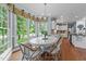 Charming dining area featuring natural light and a view to the kitchen at 5308 Stableview Ct, Holly Springs, NC 27540