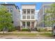 Attractive three-story home featuring a welcoming front porch and classic architectural details at 610 Velma Hopkins Ln, Raleigh, NC 27603