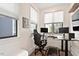 Modern home office setup with multiple monitors and gaming chair at 610 Velma Hopkins Ln, Raleigh, NC 27603