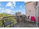 Relaxing balcony with outdoor seating and city views at 618 N Boylan Ave # 810, Raleigh, NC 27603