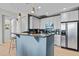 Modern kitchen with stainless steel appliances, a breakfast bar, and ample cabinet space for storage at 618 N Boylan Ave # 810, Raleigh, NC 27603