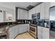 Well-appointed kitchen with stainless steel appliances, granite countertops, and ample cabinet space at 618 N Boylan Ave # 810, Raleigh, NC 27603