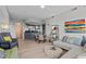Open-concept living area with modern furnishings, a bar, and stylish décor, creating a welcoming ambiance at 618 N Boylan Ave # 810, Raleigh, NC 27603