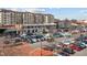 Commercial buildings with diverse stores sit behind a large parking area at 618 N Boylan Ave # 810, Raleigh, NC 27603