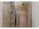Walk-in shower features a handheld sprayer and shower head with tiled walls and a glass enclosure at 618 N Boylan Ave # 810, Raleigh, NC 27603