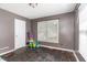 Finished basement featuring tiled flooring and a bright window at 628 Kankakee Ct, Knightdale, NC 27545