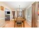 Charming dining room with hardwood floors, and views into the living room at 628 Kankakee Ct, Knightdale, NC 27545