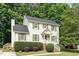 Well-maintained two-story home featuring a classic design, complemented by manicured landscaping and a cozy front porch at 628 Kankakee Ct, Knightdale, NC 27545