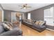 Comfortable living room with a large sofa and a view into the staircase at 628 Kankakee Ct, Knightdale, NC 27545