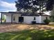 Exterior view of the house showing the backyard with an open porch at 65 Prospect Church Rd, Erwin, NC 28339