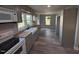 View of kitchen featuring modern appliances and an open floor plan at 65 Prospect Church Rd, Erwin, NC 28339