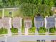 Aerial view of houses with green lawns, providing a glimpse of backyard layouts at , Knightdale, NC 27545