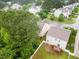 An aerial view of a home's backyard featuring a wooden deck and fenced lawn at , Knightdale, NC 27545