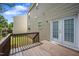 Wooden back deck features access to the home's interior and stairs down to the backyard space at , Knightdale, NC 27545