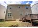 View of the backyard, showing wood deck and vinyl siding at , Knightdale, NC 27545
