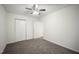 Bedroom featuring neutral walls, carpet flooring, and a closet with double doors at , Knightdale, NC 27545