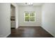 Dining room featuring hardwood floors, chandelier and large window at , Knightdale, NC 27545
