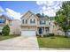 Charming two-story home with a well-maintained lawn and attached two car garage at , Knightdale, NC 27545